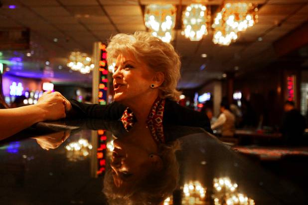 Las Vegas mayor candidate Carolyn Goodman schmoozes with a potential voter during a campaign event this month at El Cortez.