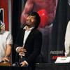 Boxer Manny Pacquiao, center, of the Philippines laughs during a news conference at the MGM Grand Garden Arena Saturday, February 12, 2011. Trainer Freddie Roach is at left. Pacquiao and opponent Shane Mosley of Pomona, Calif. are promoting their May 7 welterweight fight at the arena. 