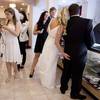 Nadya Borislav, left, walks to the elevator after getting married as Brian Rosborough, right, and Anji Le Dent, second from left, of Sunset Beach, Calif., wait for their turn in the chapel at the Little White Wedding Chapel, Monday, Feb. 14, 2011 in Las Vegas. 