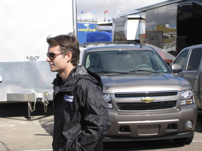 Race winner Jeff Gordon as he walked to the drivers' meeting before the race