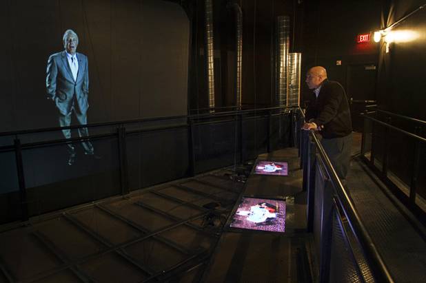 Andrew De Maio listens to virtual guide James Caan during a preview of the Las Vegas Mob Experience at the Tropicana Tuesday, March 1, 2011. 
