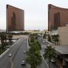 The Encore is shown to the left of the Wynn Las Vegas on the Strip. 