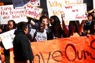 Students rally outside Chaparral High School on Wednesday, March 9, 2011, in protest of the district's plans to reorganize the school.