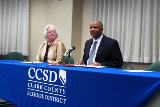 Superintendent Dwight Jones speaks with the media with School Board President Carolyn Edwards about the district's School Improvement Grant application.
