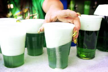 Serving green beer outside Fitzgerald’s Casino in downtown Las Vegas during St. Patrick’s Day Thursday, March 17, 2011.