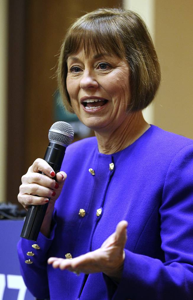 Nevada congressional candidate Sharron Angle answers questions from the media in Reno on Monday, March 22, 2011.
