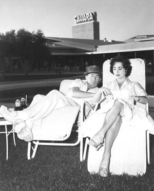 Michael Wilding and Elizabeth Taylor at the Sahara on March 7, 1956. 