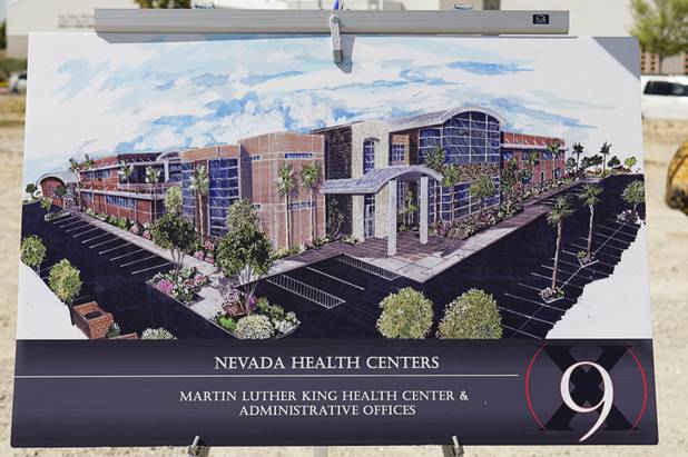 An artist's illustration showing how the Nevada Health Center's Martin Luther King Health Center and Administrative Office building will look when completed is displayed during the groundbreaking for the facility near Martin Luther King Jr. and Lake Mead boulevards Monday, March 28, 2011.