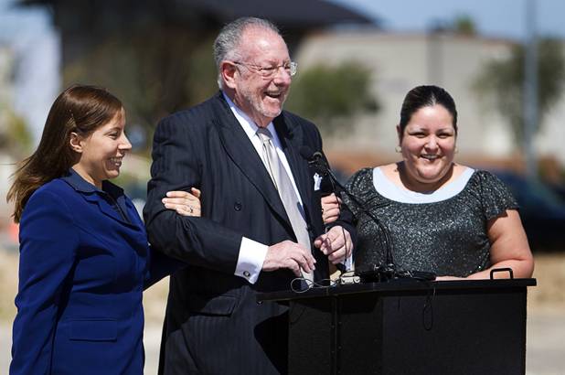Las Vegas Mayor Oscar Goodman is accompanied by Brenda Karcz, left, and Maybeth Andrade during the groundbreaking for the Nevada Health Centers' Martin Luther King Health Center and Administrative Office building near Martin Luther King and Lake Mead boulevards Monday, March 28, 2011. Goodman joked that his regular showgirls didn't want to scuff their shoes in the unimproved lot. Karcz is the human resources coordinator and Andrade is call center supervisor for the Nevada Health Centers.