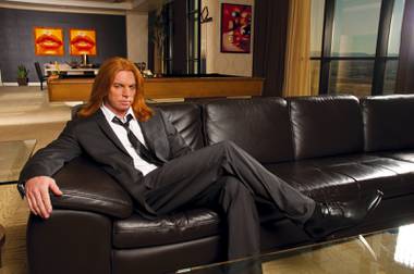 Comedian Scott “Carrot Top” Thompson poses during a cover shoot for Las Vegas Magazine, March 28, 2011.