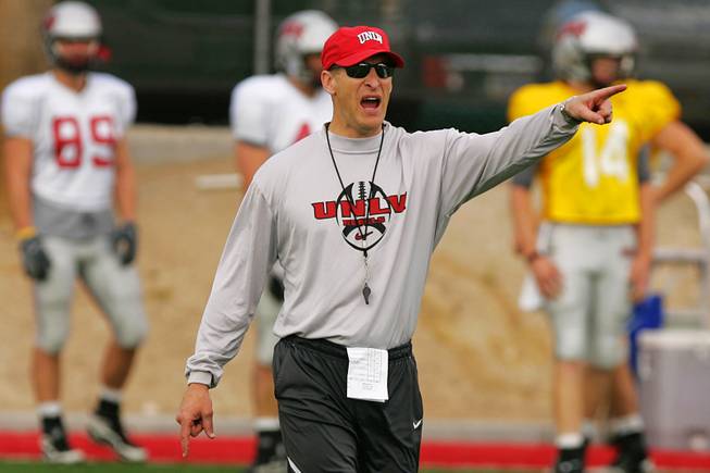 Coach Bobby Hauck yells commands during UNLV's annual spring intrasquad football game Saturday, April 2, 2011.