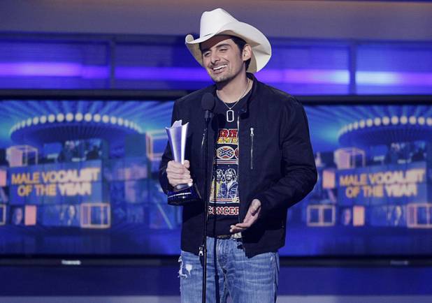 Brad Paisley accepts his award for Male Vocalist of the Year during the 46th annual Academy of Country Music Awards  at the MGM Grand Garden Arena Sunday, April 3, 2011. It was the fifth straight top male vocalist of the year award for Paisley.