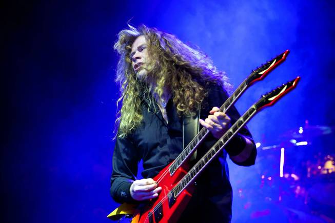 Singer and guitarist Dave Mustaine of the American trash metal band Megadeth performs during their concert in the Budapest Sports Arena in Budapest, Hungary, late Friday, April 8, 2011. 