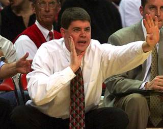 UNLV assistant coach Dave Rice yells to Rebel players as they take on Georgetown at the Thomas & Mack Center Sunday, November 28, 1999. The Rebels defeated the Hoyas 85-69.