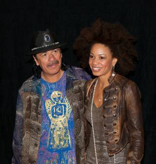 Carlos Santana and Cindy Blackman at the Hard Rock Hotel for the unveiling of the Santana memorabilia display on April 12, 2011.

