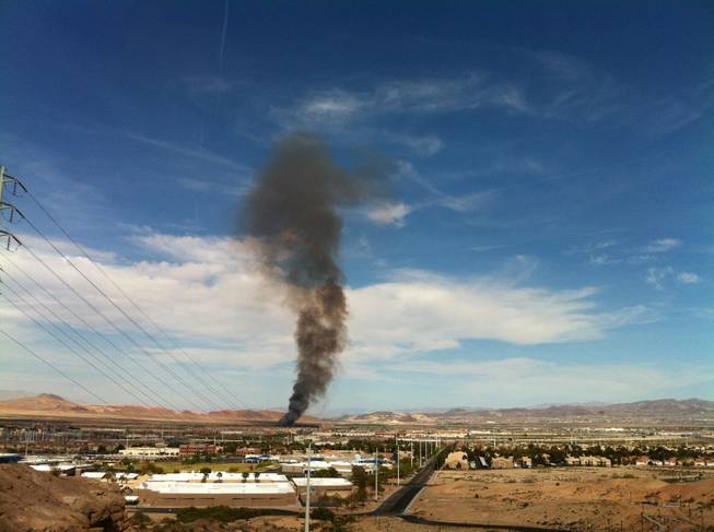 Smoke from a brush fire near Sam Boyd Stadium could be seen across the valley Saturday afternoon.