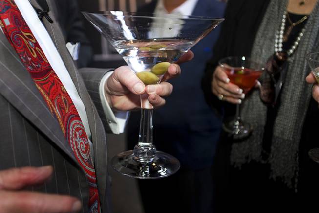 Mayor Oscar Goodman holds a drink at the Artifice lounge ...