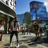 Tourists are seen at the entrance to Planet Hollywood on the Strip Thursday, April 28, 2011.