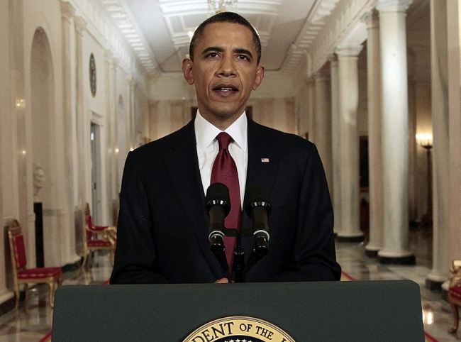 President Barack Obama reads his statement to photographers after making a televised statement on the death of Osama bin Laden from the East Room of the White House in Washington, Sunday, May 1, 2011. 