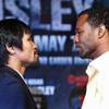 Boxer Manny Pacquiao, left, of the Philippines  faces off with Shane Mosley of Pomona, Calif. during a news conference at the MGM Grand Wednesday, May 4, 2011. Pacquiao will defend his WBO welterweight title against Mosley at the MGM Grand Garden Arena on Saturday.
