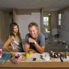 Husband and wife team Scott and Aimie Yancey pose in the kitchen of a foreclosure home in Summerlin Thursday, August 4, 2011. The couple is negotiating to buy the home for their television show "Flipping Vegas." The show airs Saturdays at noon on the A&E channel. Once a $1.6 million property, the home is now completely trashed and will require a major make-over.