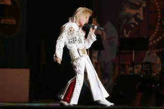 Gabriel Jarrett, a 6-year-old from Jacksonville, Fla., performs during the second annual Las Vegas Ultimate Elvis Tribute Artist Contest  Saturday, May 7, 2011 at the Fremont Street Experience.