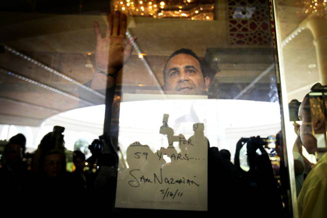 Sam Nazarian, the CEO of SBE Enertainment, the company that owns the Sahara, waves goodbye to the crowd after locking the door to the casino Monday, May 16, 2011.