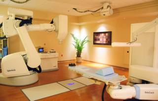 The new $6 million CyberKnife radiotherapy machine at Summerlin Hospital allows oncologists to treat hard-to-reach tumors. The new technology is part of a two-year, $10 million diagnostic and treatment technology investment made by the Comprehensive Cancer Centers of Nevada. 