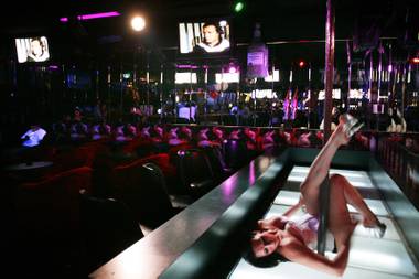 Chicas Bonitas dancer Liz takes the stage at Chicas Bonitas strip club in North Las Vegas on Thursday, May 19, 2011.