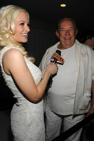 Holly Madison and Robin Leach at the Nikki Beach and Club Nikki White Party Grand Opening at the Tropicana on May 26, 2011.