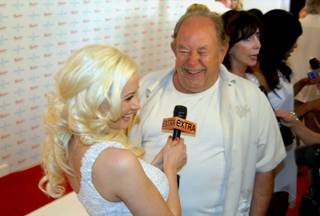 Holly Madison and Robin Leach at the Nikki Beach and Club Nikki White Party Grand Opening at the Tropicana on May 26, 2011. 