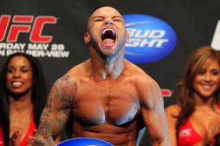 Thiago Alves yells as he makes weight during the UFC 130 weigh-in Friday, May 27, 2011 at the MGM Grand Garden Arena.