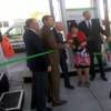 Clark County Commissioner Mary Beth Scow cuts a ribbon Thursday at a new compressed natural gas vehicle fueling station with Clean Energy Chairman Warren Mitchell. They were joined by, from left, Peter Grace, senior vice president of Clean Energy; Brent Bell, president of Whittlesea Bell Transportation; and Jeff Shaw, CEO of Southwest Gas. 