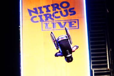 Aaron “Wheelz” Fotheringham of Las Vegas performs a front flip off the 50-foot-high Nitro Giganta Ramp during “Nitro Circus Live” on Saturday, June 4, 2011, at MGM Grand Garden Arena.