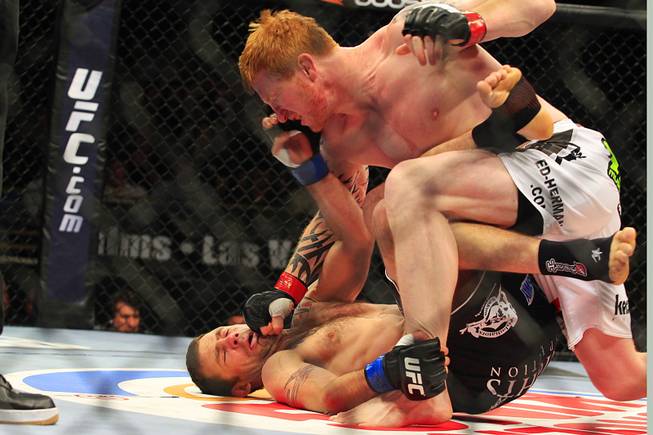 Ed Herman finishes off Tim Credeur during their bout at The Ultimate Fighter Season 13 finale Saturday, June 4, 2011.
