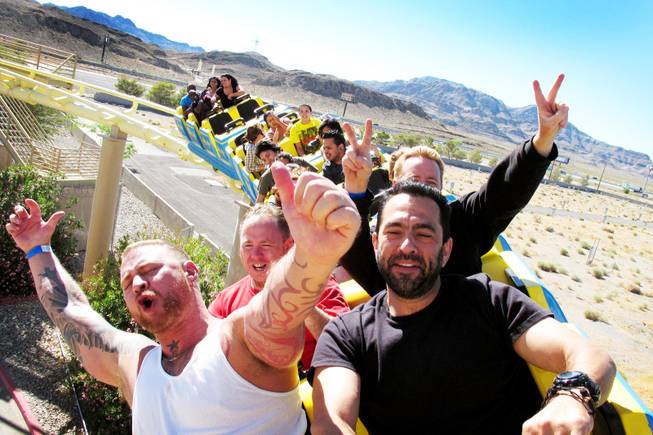 Daryl Terry and Brian Cordova of Las Vegas ride the Desperado roller coaster at Buffalo Bill's in Primm on Monday, June 6, 2011.