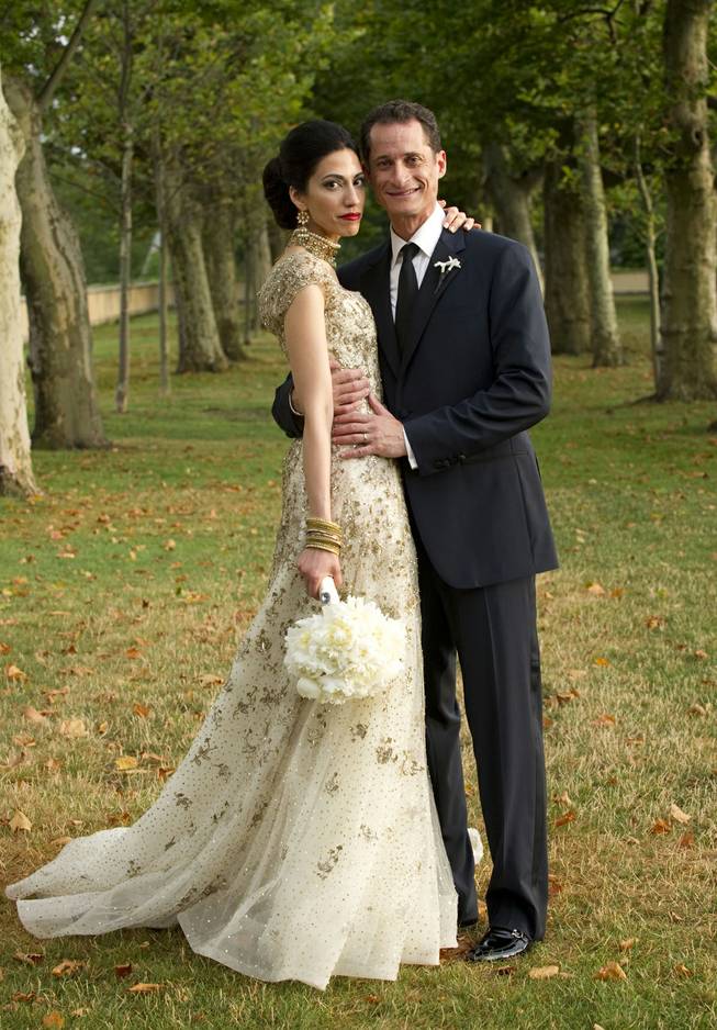 Rep. Anthony Weiner, D-N.Y., poses with his wife, Huma Abedin, in this July 10, 2010, file photo. 
