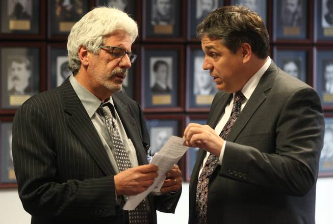 Lobbyist Billy Vassiliadis, left, talks with Nevada Assemblyman Marcus Conklin, D-Las Vegas, on June 6, 2011, at the Legislature in Carson City.