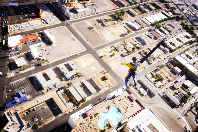 A jumper takes the plunge from SkyJump at the top of the Stratosphere in Las Vegas on Tuesday, June 7, 2011.