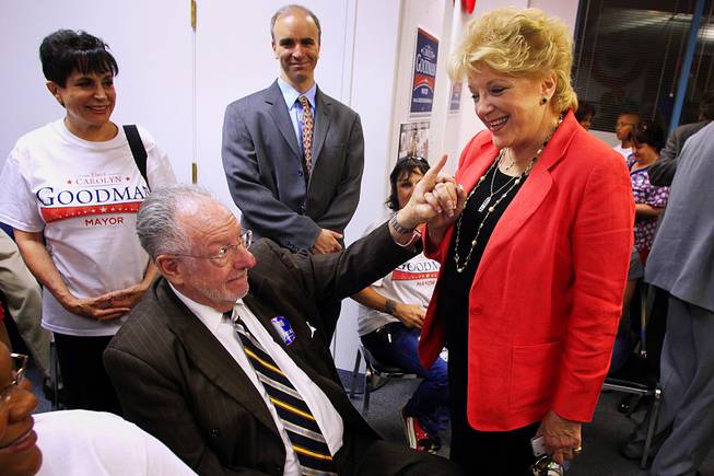 Las Vegas Oscar Goodman points to his wife, mayoral candidate Carolyn Goodman, as early returns show her with a sizable lead during an election night party at her campaign headquarters Tuesday, June 7, 2011.