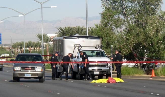 Henderson Police were investigating whether a fatal collision was a suicide Thursday morning on Lake Mead Parkway near Water Street.