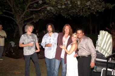 John Waite, middle, with members of his band and Steve and Dana Arcana.