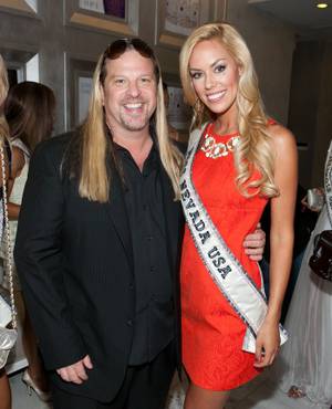 The Miss Universe Organization reveals the limited-edition Miss Universe by OPI shades at Michael Boychuck's salon Color at Caesars Palace on June 14, 2011. Boychuck and Miss Nevada USA Sarah Chapman are pictured here.

