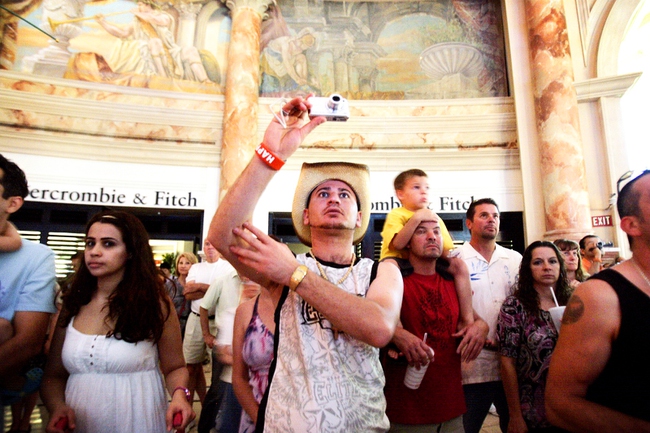 Guests watch the Fall of Atlantis show the Atlantis Aquarium at the Forum Shops at Caesar's Palace Wednesday, June 15, 2011.