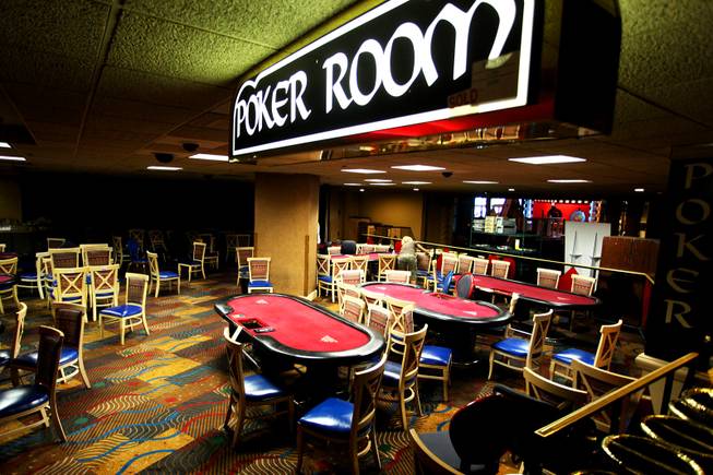 Shoppers scavenge the poker room during the first day of ...