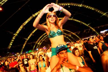 Voni Susco and Michael Barto dance to the music at the circuitGrounds during the Electric Daisy Carnival at the Las Vegas Motor Speedway Sunday, June 26,&nbsp;2011.