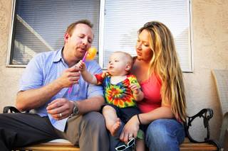 Jeff Iverson is shown with his wife Lisa and their 16-month-old son Caden at Freedom House Sober Living apartments in Las Vegas Wednesday, June 29, 2011.