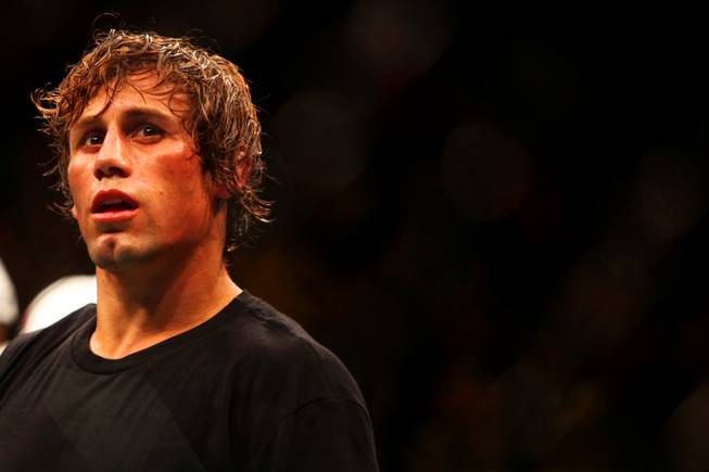 Urijah Faber looks away as the decision is announced after the main event bout at UFC 132 against Dominick Cruz during UFC 132 Saturday at the MGM Grand Garden Arena.  Cruz won by unanimous decision.