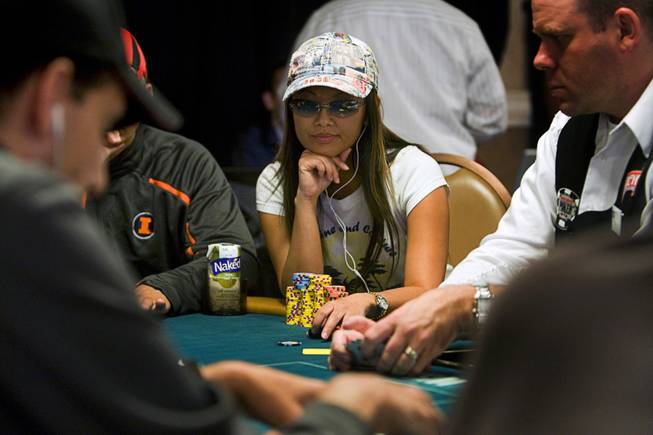 Poker player Lisa Hamilton competes during the World Series of Poker main event at the Rio Monday, July 11, 2011.