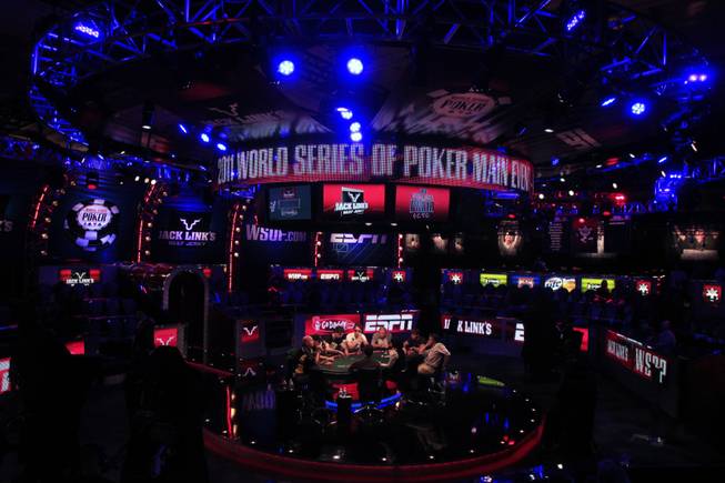 Play continues at the featured table during the 2011 World Series of Poker Friday, July 15, 2011.